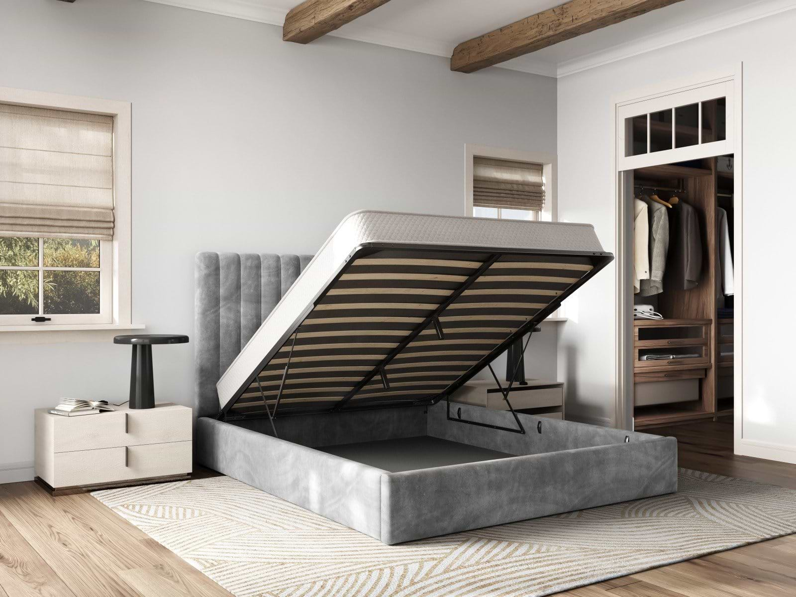 double ottoman bed that is open to reveal storage space