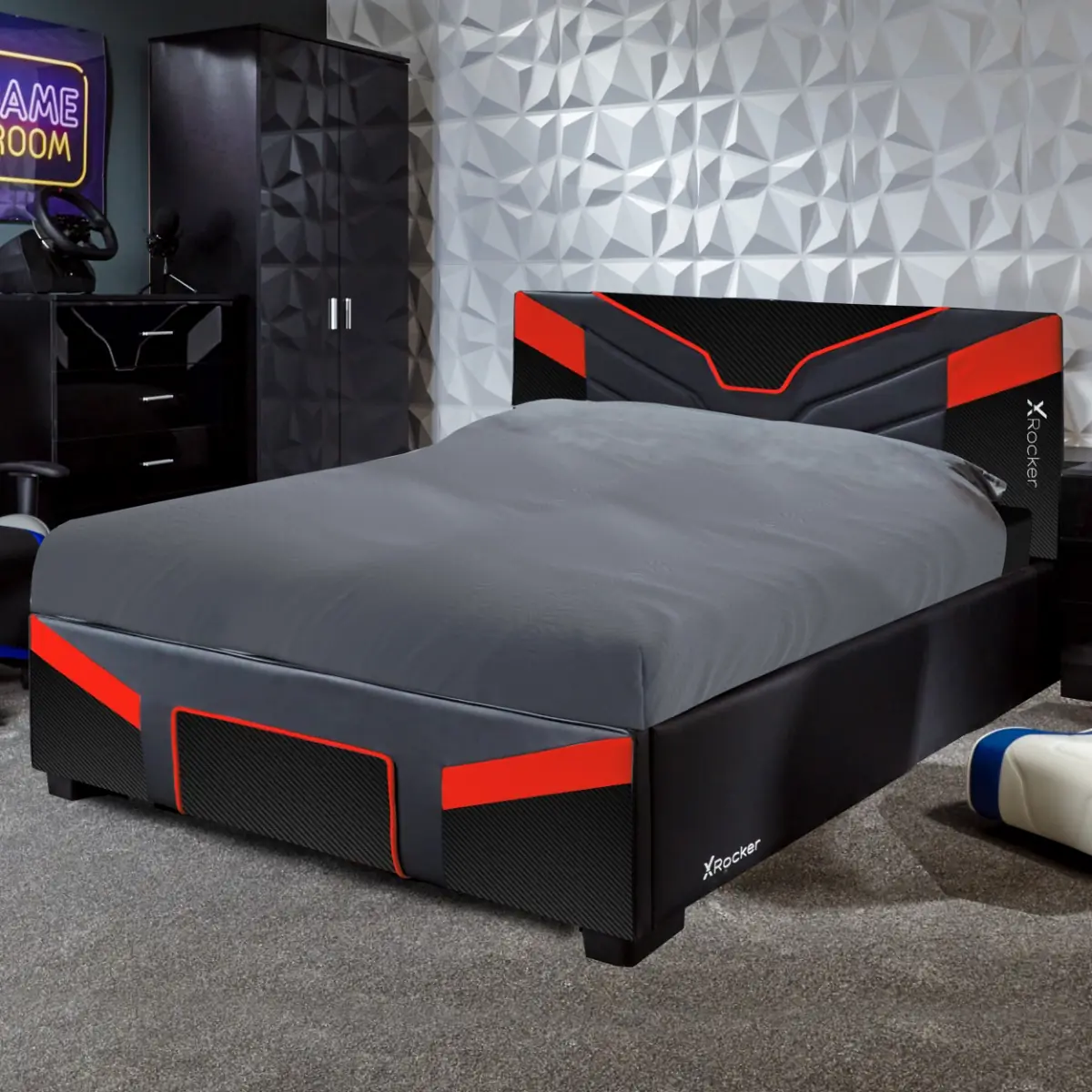 Black small doible ottoman bed designed for gamers, with red trim and grey bedsheets
