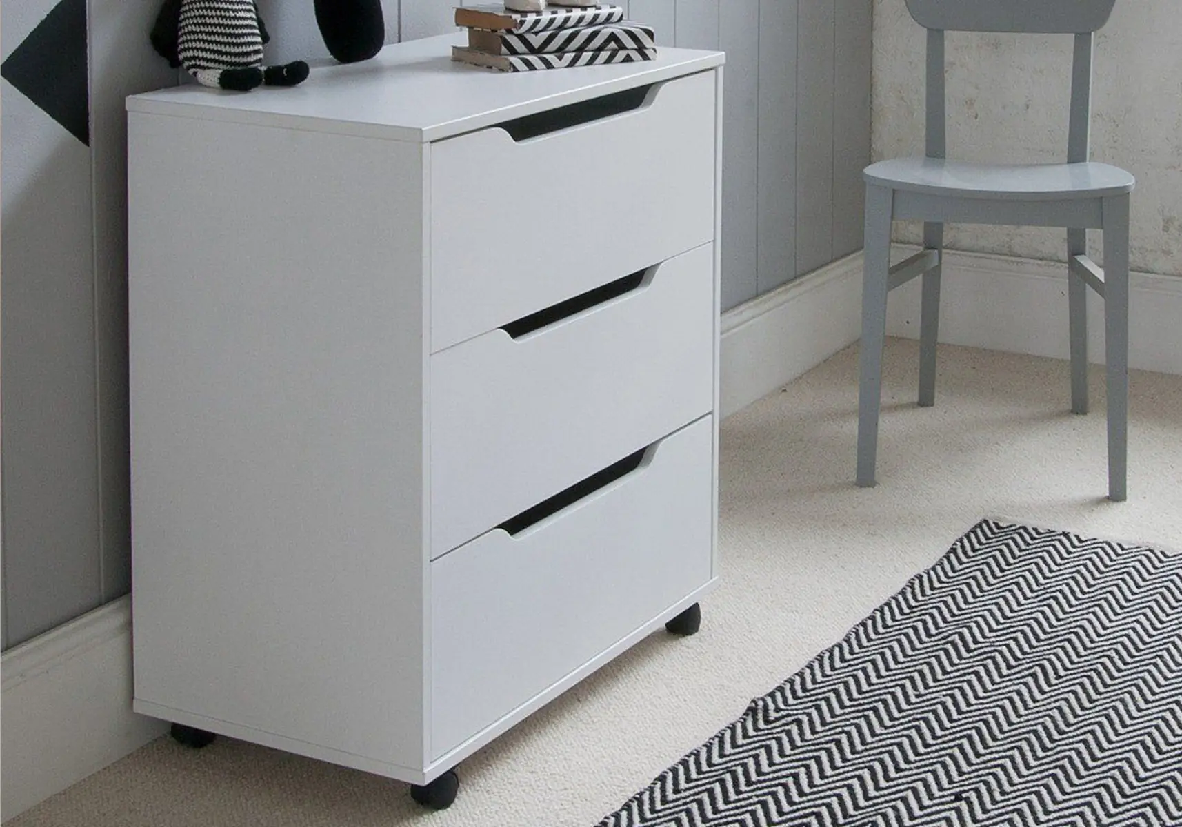 white chest of drawers for a child's bedroom