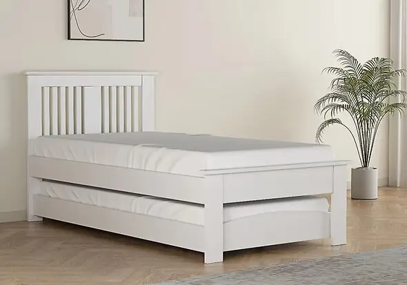 Contemporary oak finish guest bed with pull out under bed. Slatted headboard with a plinth top. Low foot end with a plinth top.