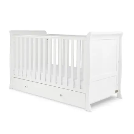 Classic styled white cot bed with storage drawer beneath by Ickle Bubba