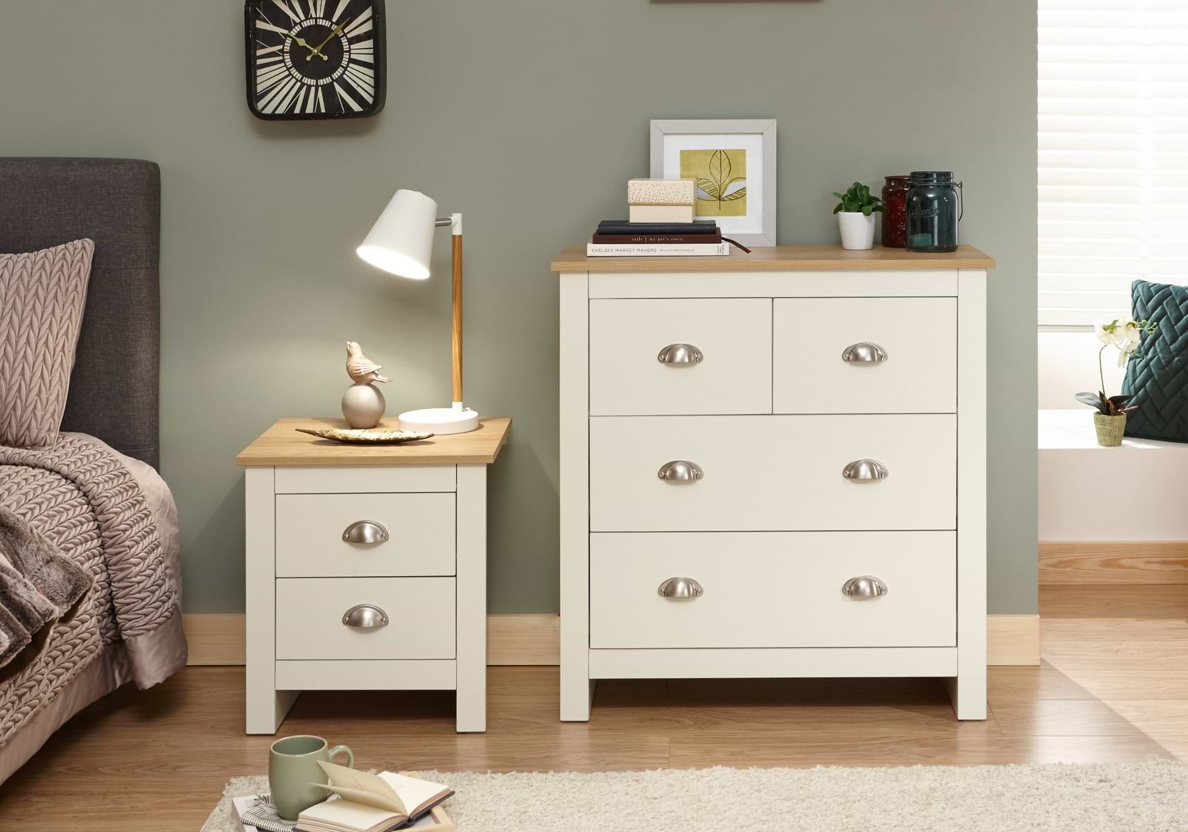 Two cream bedside tables, one large and one small
