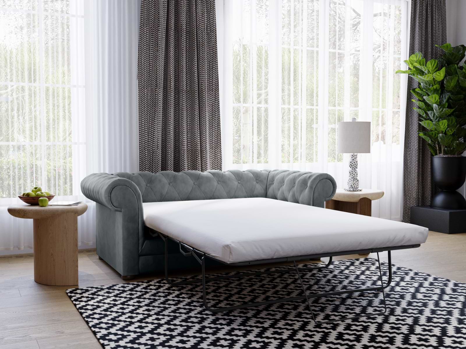 Grey sofa bed folded out into bed form