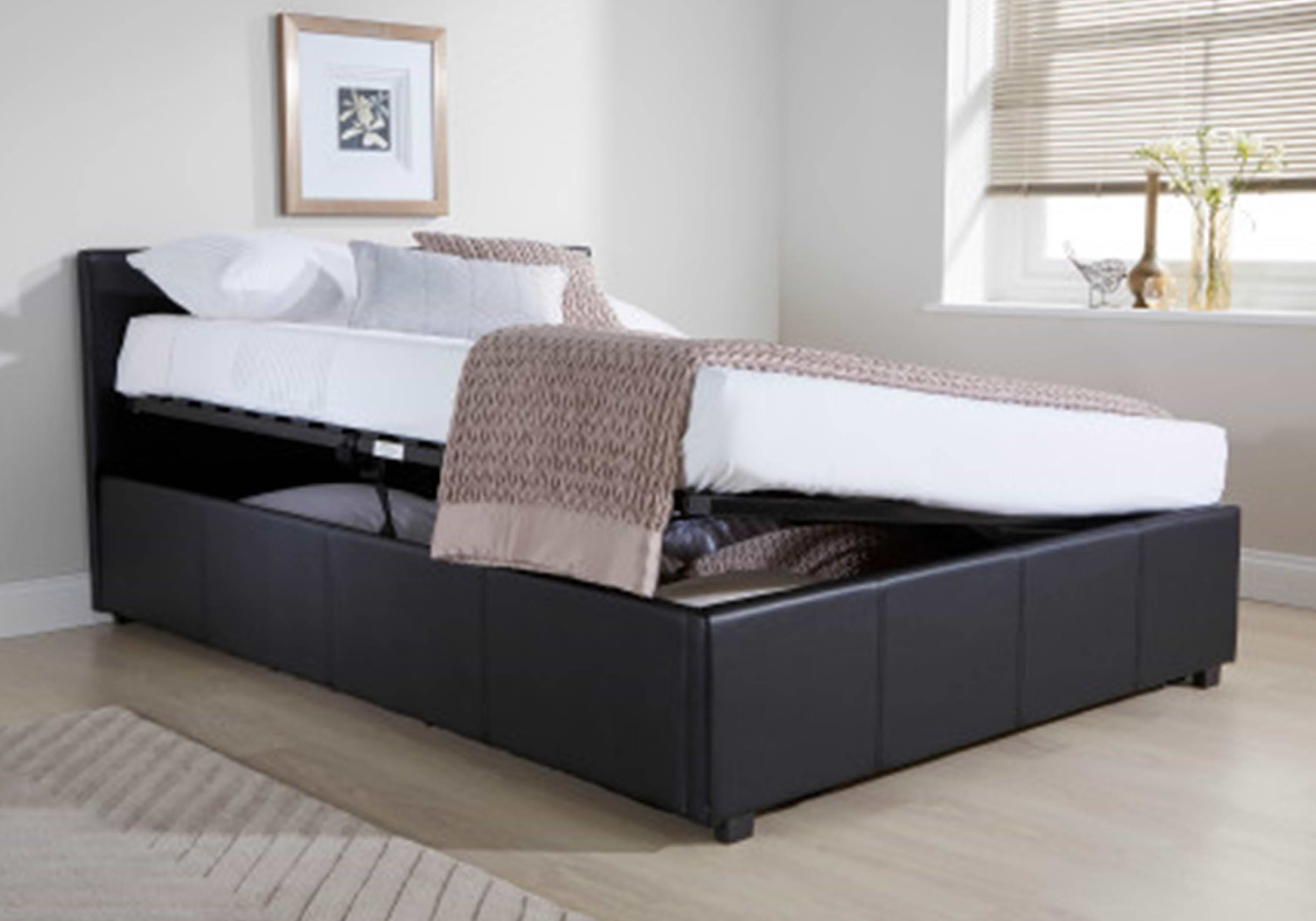 Black king size ottoman bed that opens from the side to reveal storage space underneath