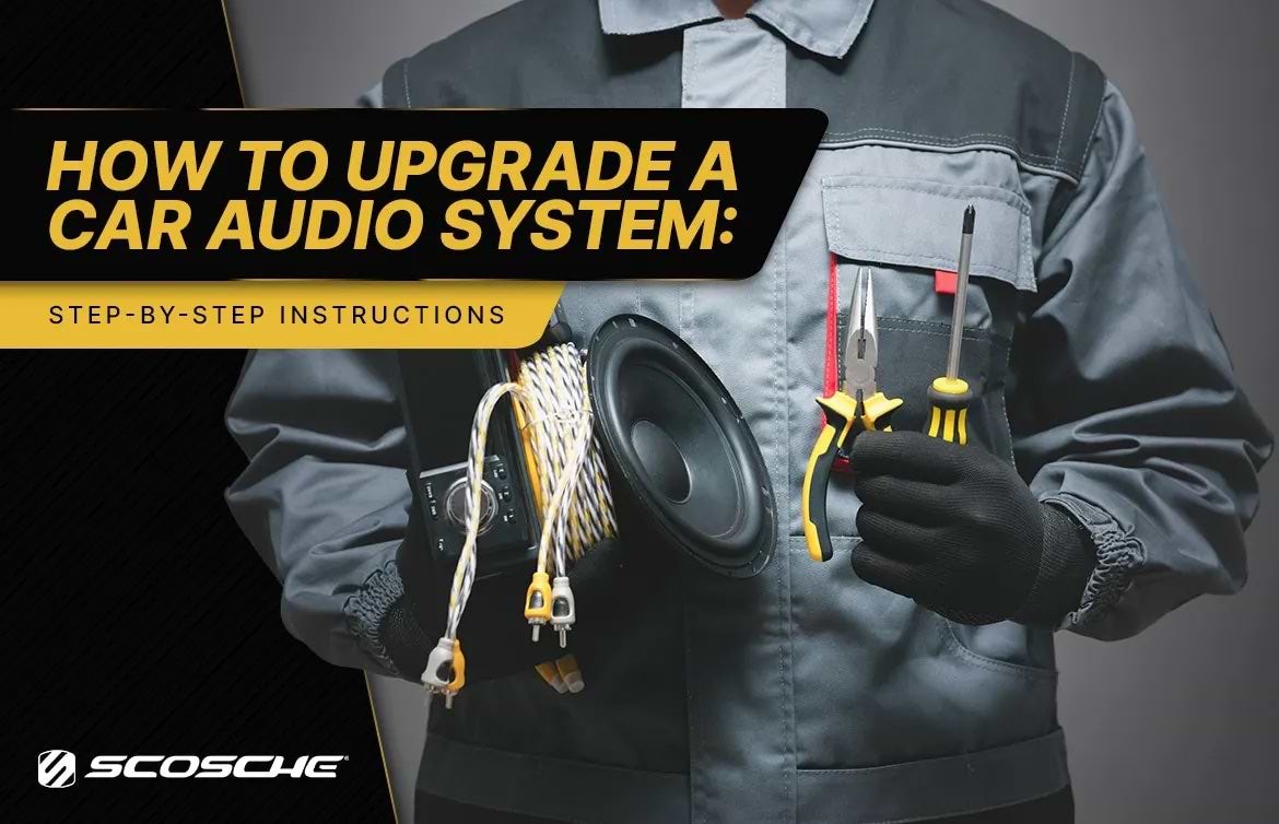 How to Upgrade a Car Audio System: Step-By-Step Instructions How to Upgrade a Car Audio System: Step-By-Step Instructions. Man holding car audio tools.