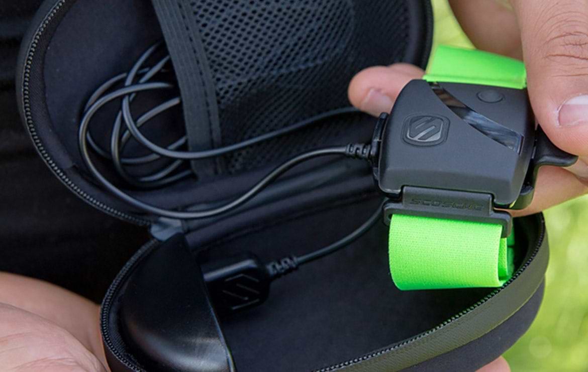 Charge Case man holding heart rate monitor in charging case