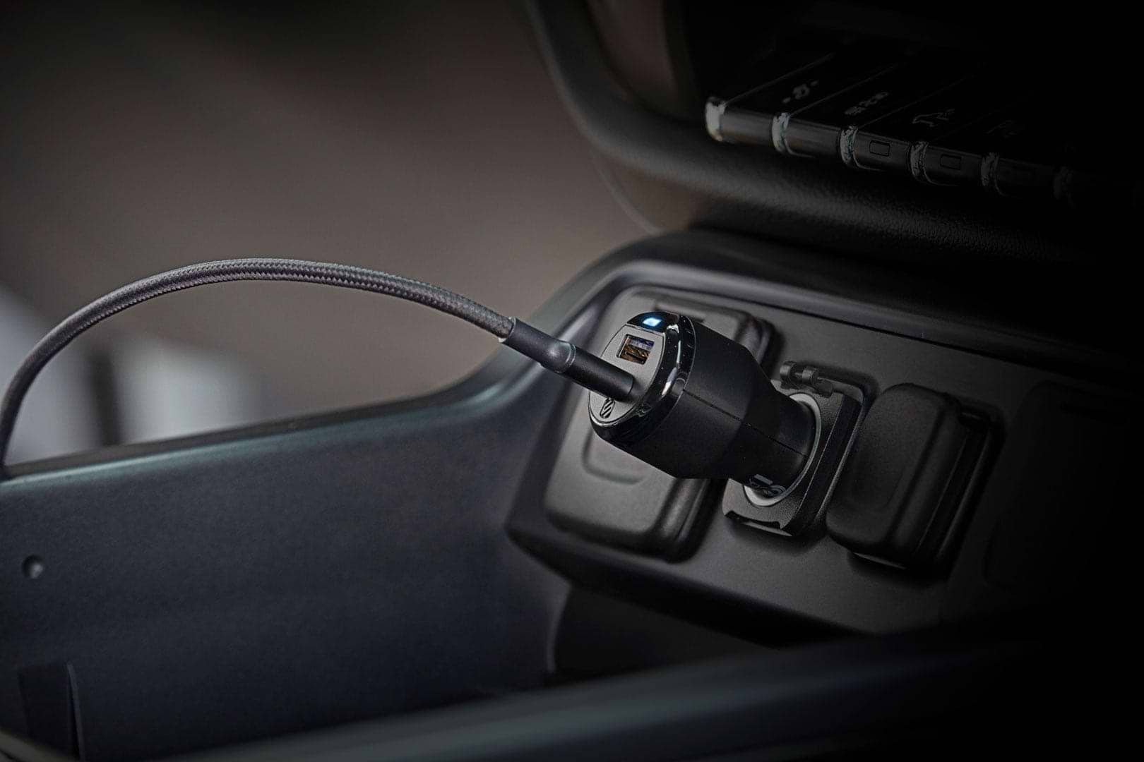 dual port car charger with USB-A and USB-C ports in vehicle 12v socket