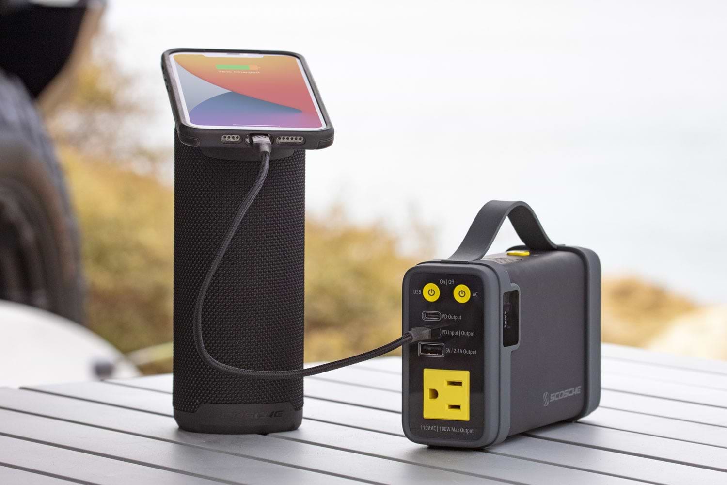 iphone charging via Scosche portable power station while mounted to MagSafe portable bluetooth speaker