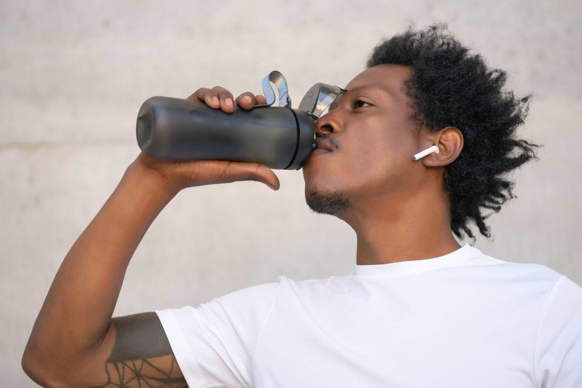 athletic man drinking water athletic man drinking water