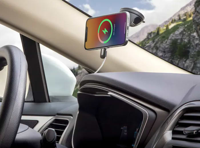 charging phone phone charging via puck charger while mounted to windshield