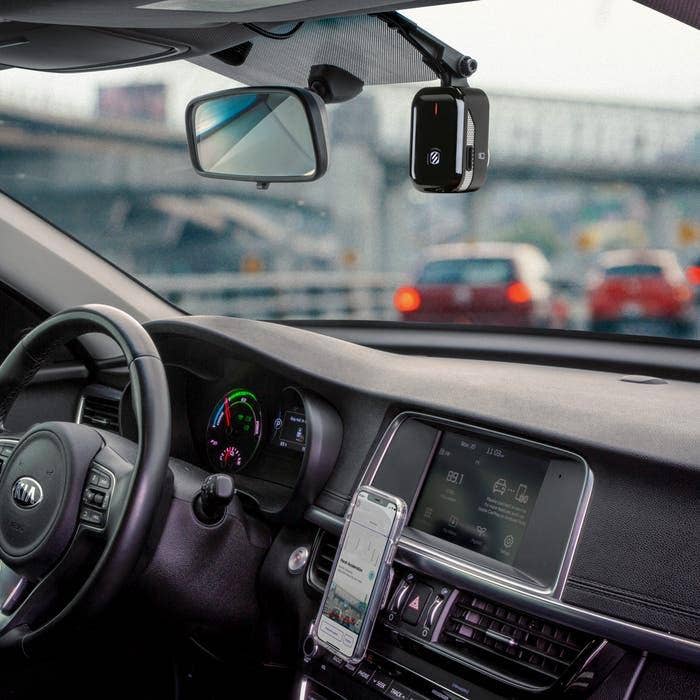 dash cam dash cam mounted to car windshield with iphone mounted to vent mount