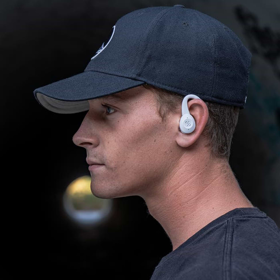 thudbuds tws true wireless earbuds man with hat wearing white thudbuds tws true wireless earbuds