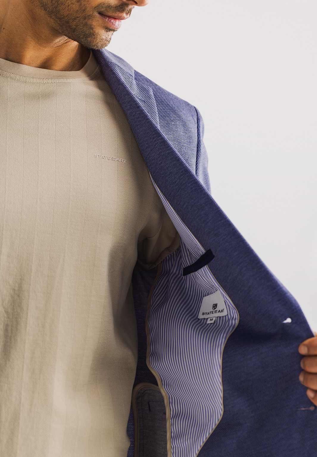 Gemêleerde-blazer-van-gebreide-stof