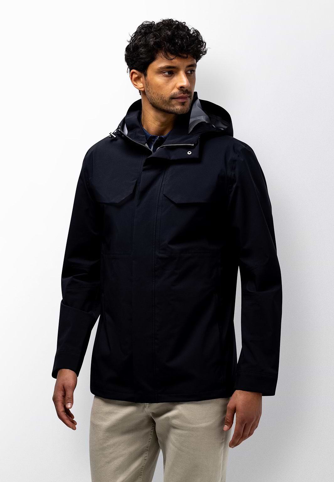 Parka-met-capuchon-en-ritszakken