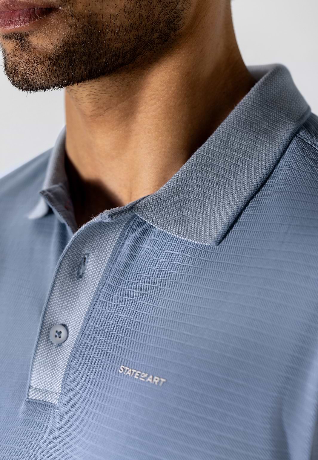 Jersey-polo-met-structuurdessin