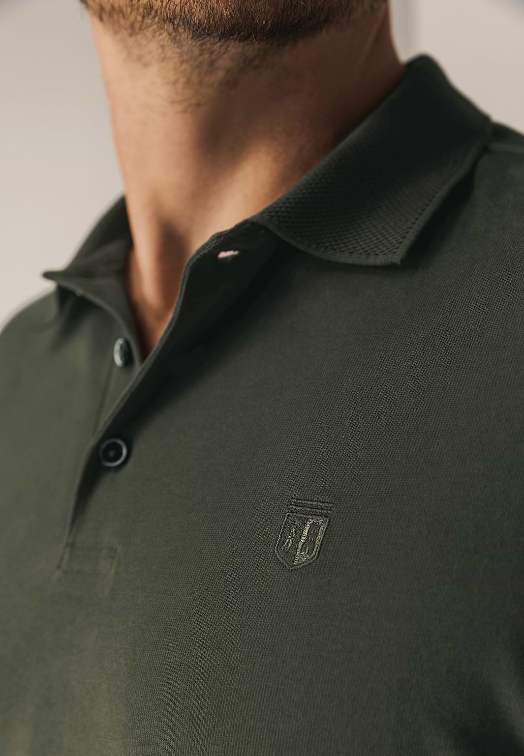 Polo-met-structuurgebreide-kraag