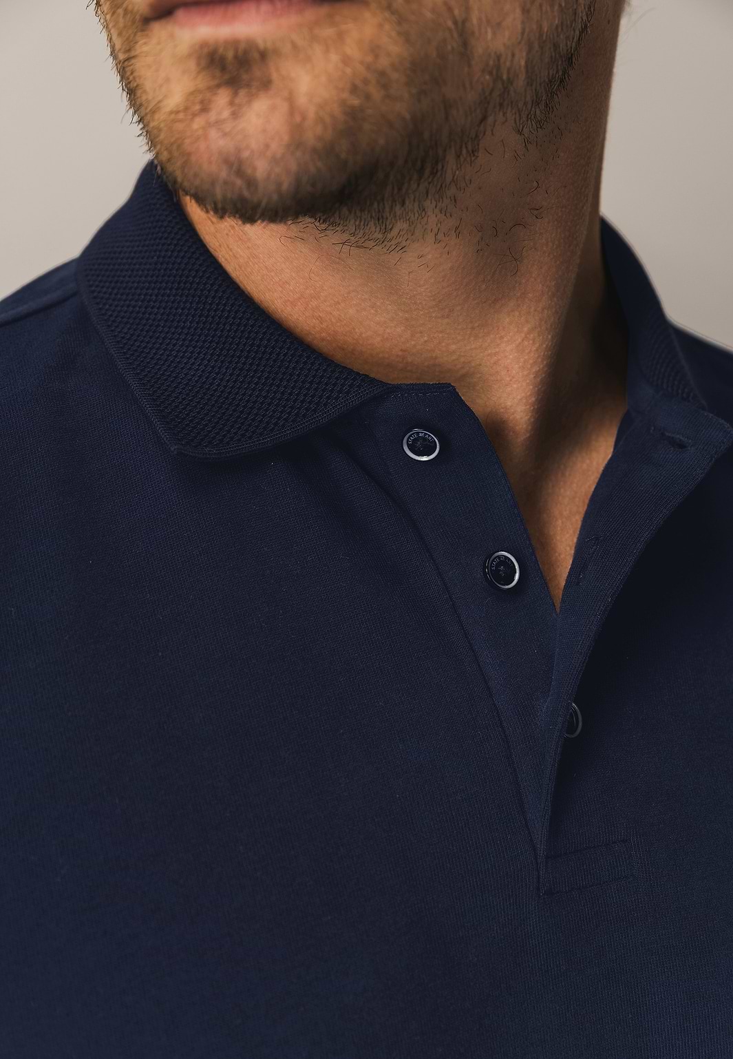 Polo-met-structuurgebreide-kraag