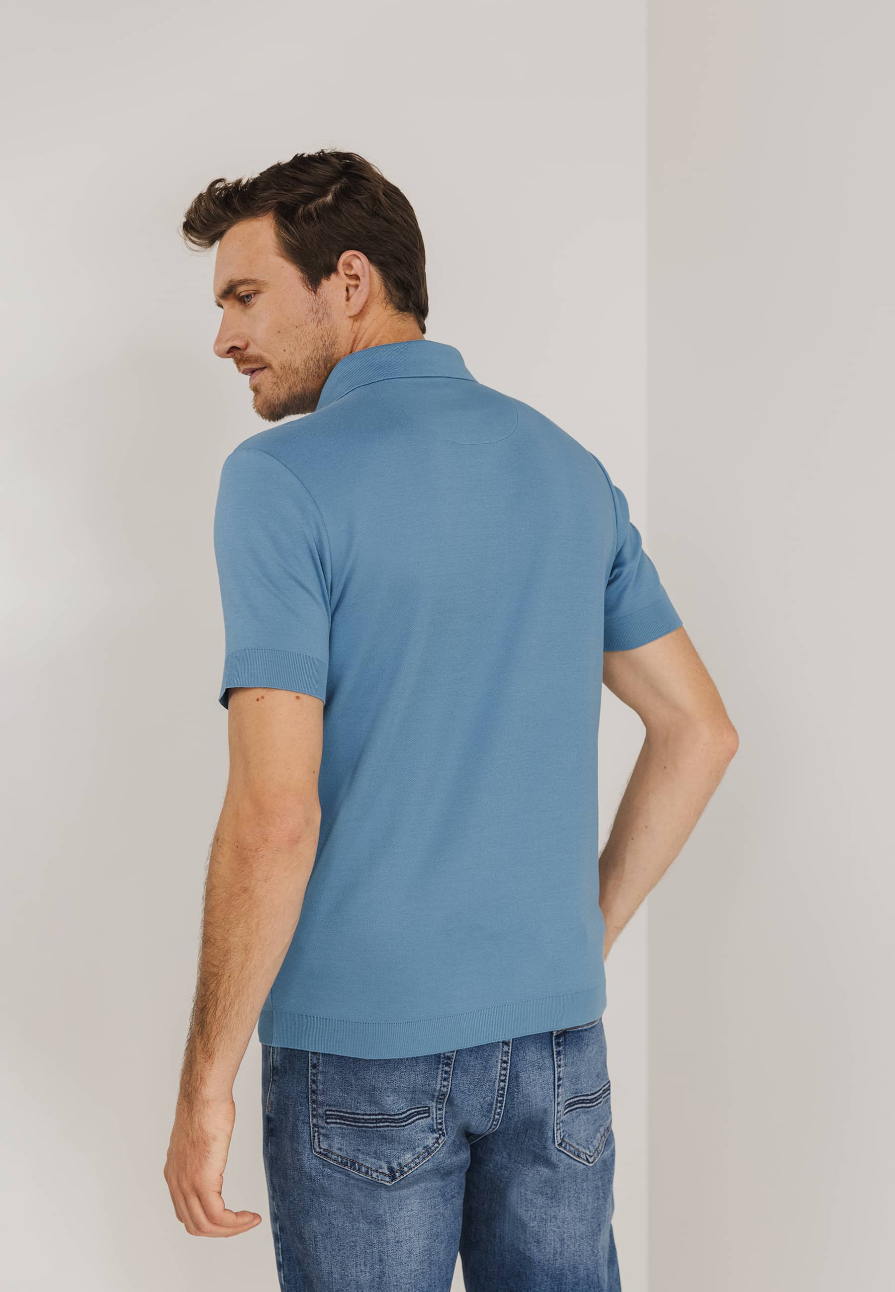 Gebreide-polo-met-rubberen-print