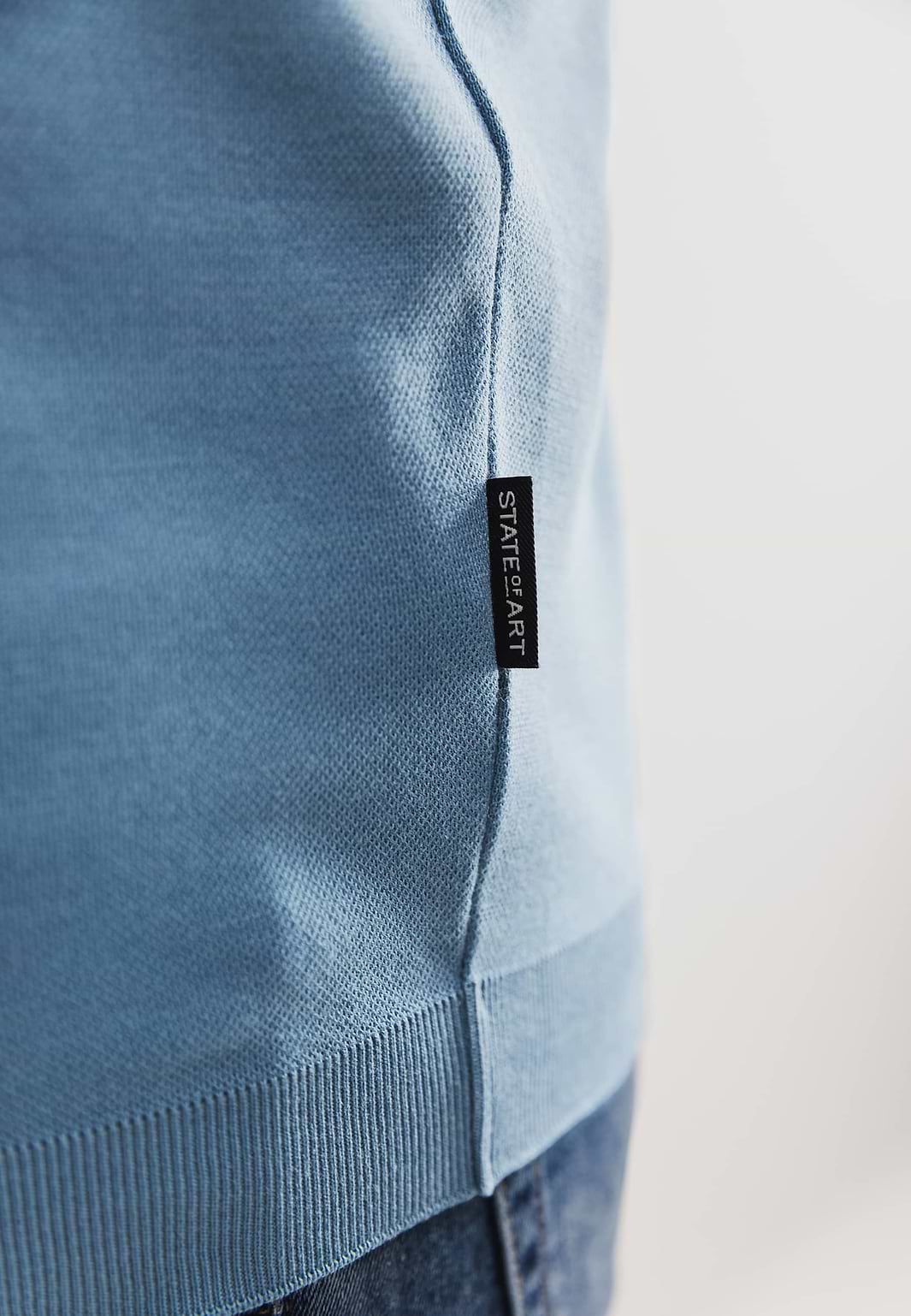 Gebreide-polo-met-rubberen-print