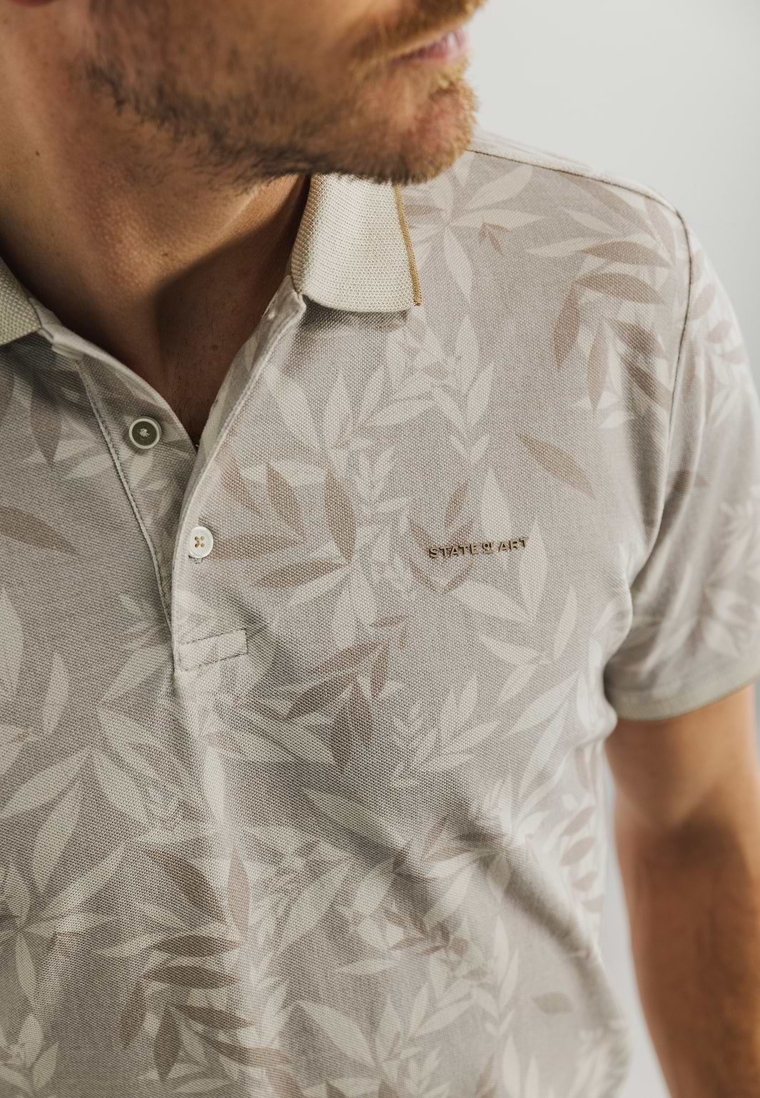 Bedrukte-jersey-polo-met-oxford-kraag
