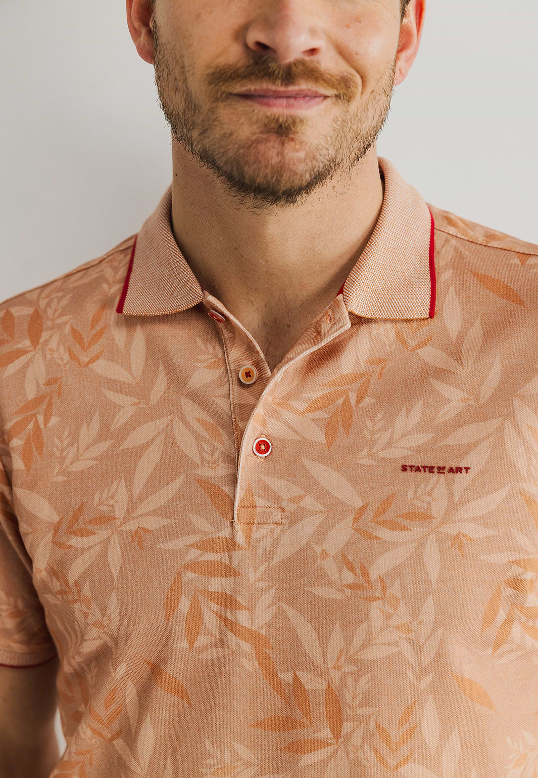 Bedrukte-jersey-polo-met-oxford-kraag
