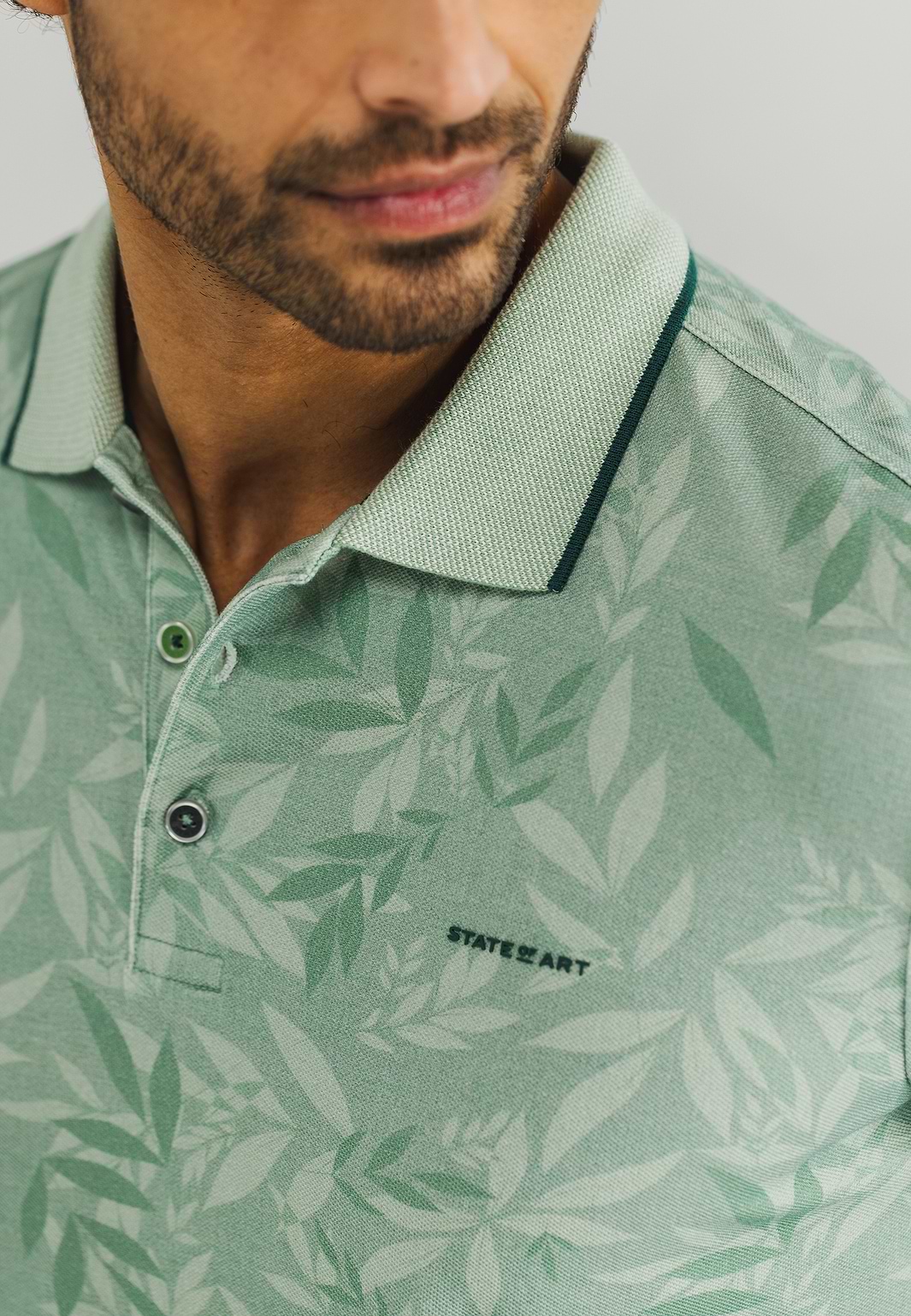 Bedrukte-jersey-polo-met-oxford-kraag