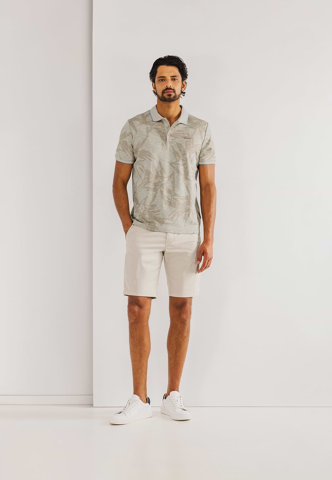 Piqué-polo-met-all-over-print
