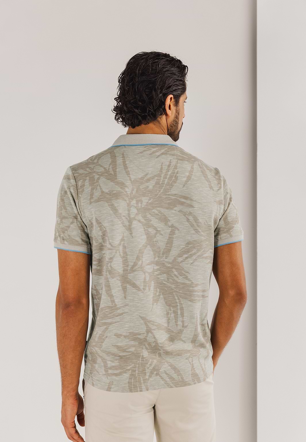 Piqué-polo-met-all-over-print