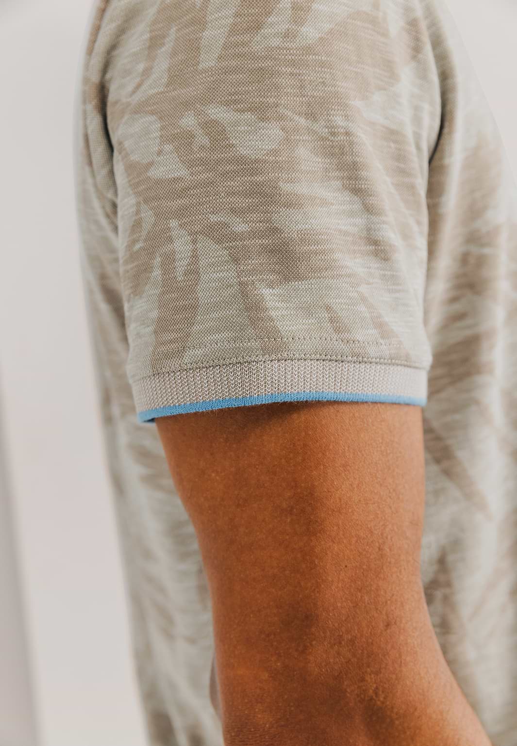 Piqué-polo-met-all-over-print