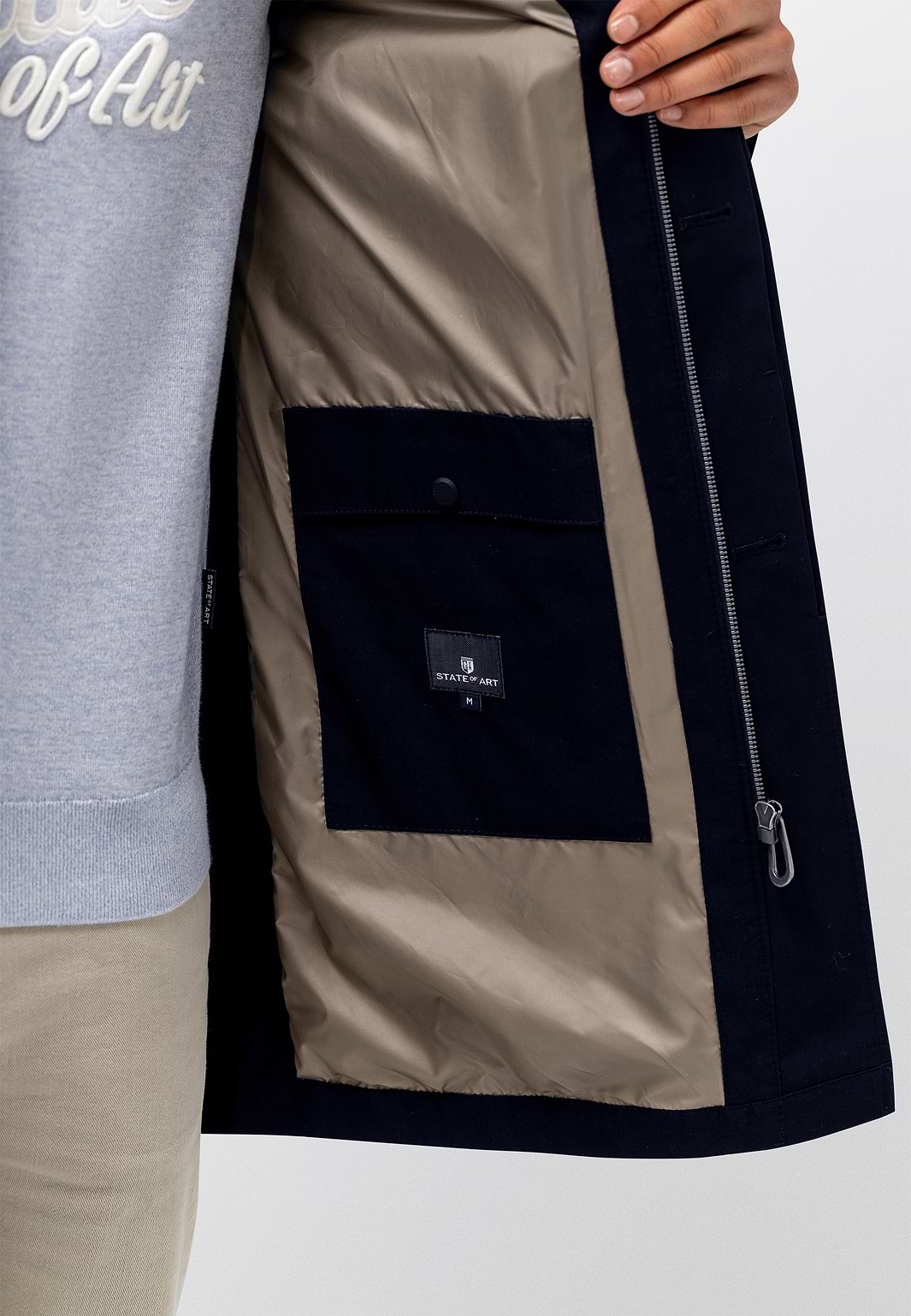 Mantel-met-blinde-sluiting