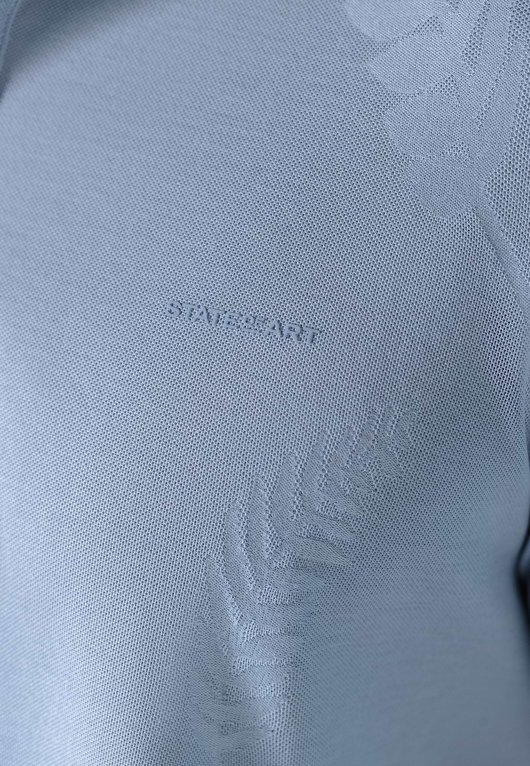 Piqué-polo-with-jacquard-leaf-pattern