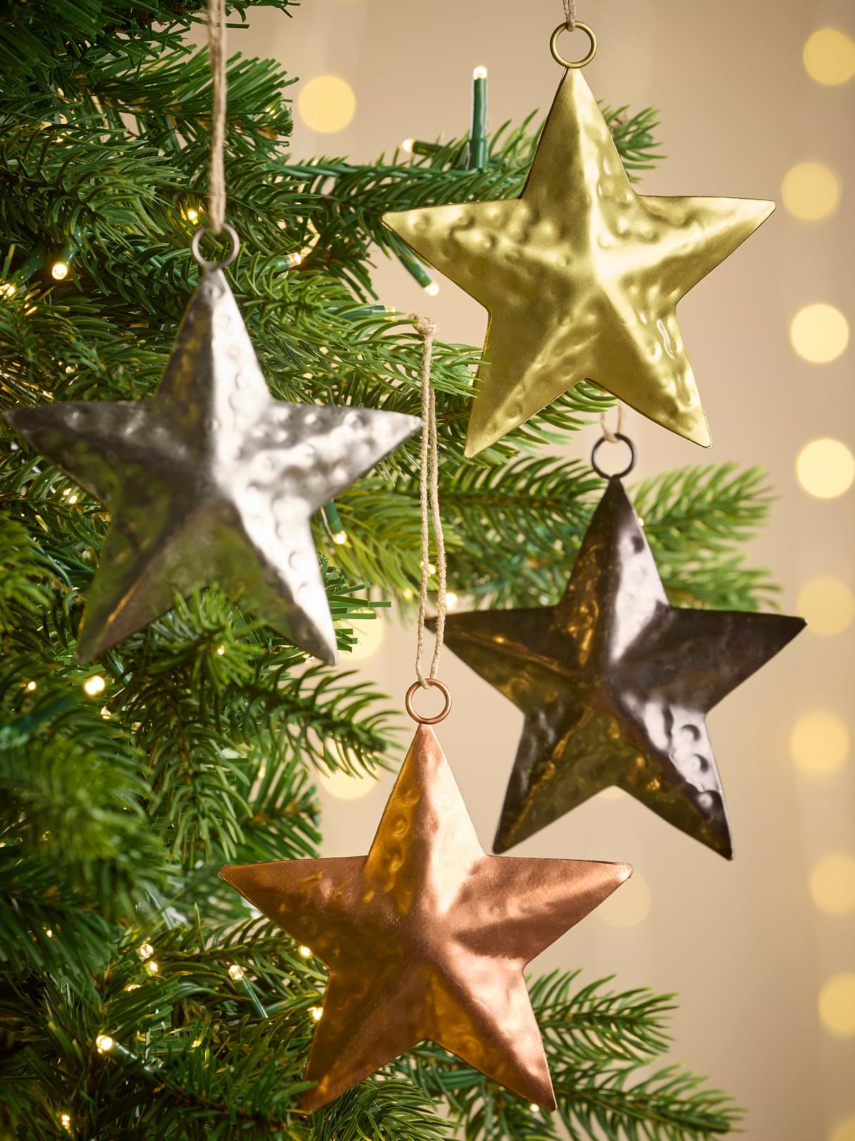 Four Metallic Hanging Stars