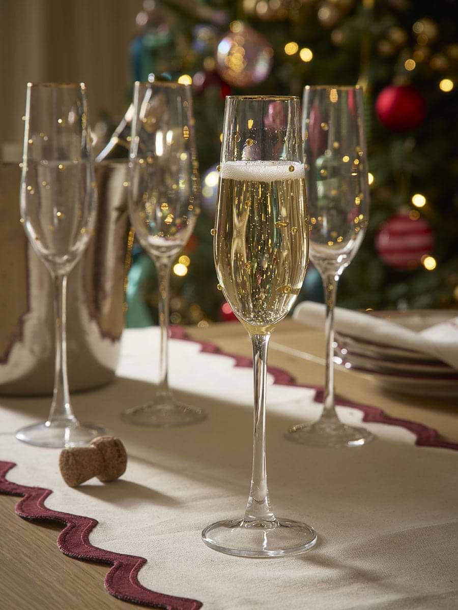 Four Gold Dot Champagne Glasses