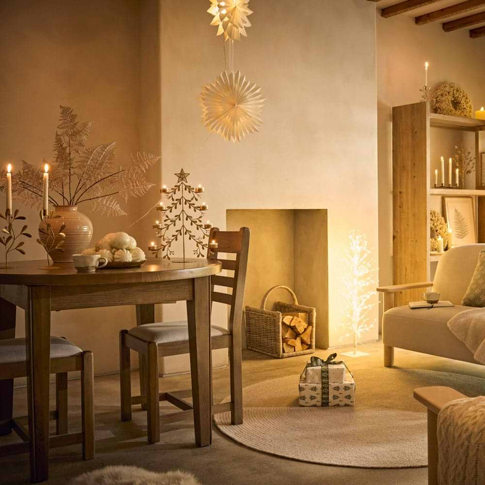 A cosy sitting room dressed with scandi decorations