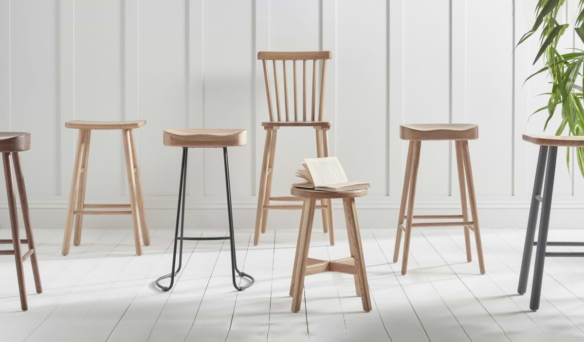 A selection of wooden kitchen stools, metal kitchen island stools and counter stools