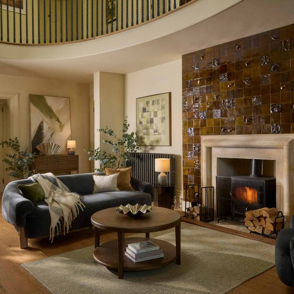 A large cream rug in a cosy living room scene