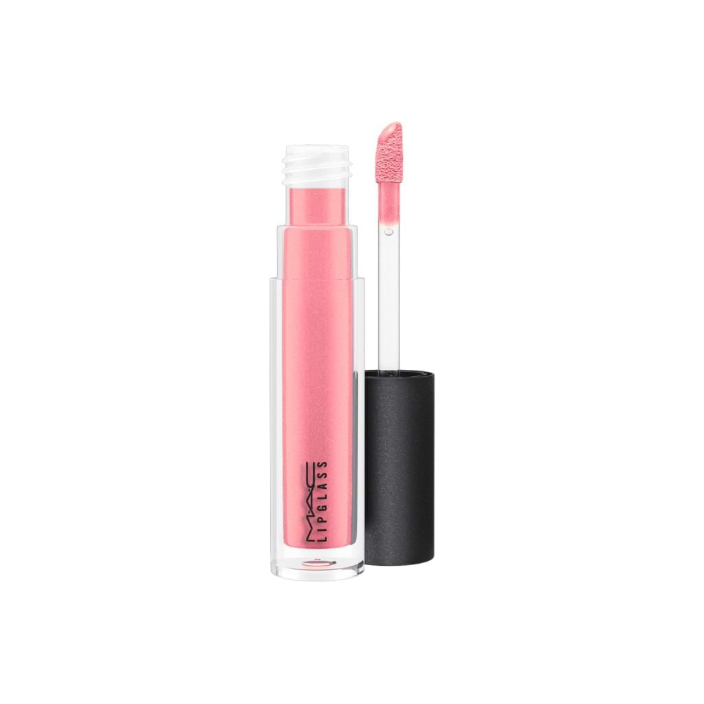 MAC Lipglass Lipgloss - MAC - Duty Free - גלוס ייחודי במגוון רחב של צבעים המעניקים גימור זכוכית או ברק עדין. ניתן להשתמש בפני עצמו, או על עיפרון או שפתון, זהו השפתון המושלם ליצירת ברק שנמשך. פיגמנט