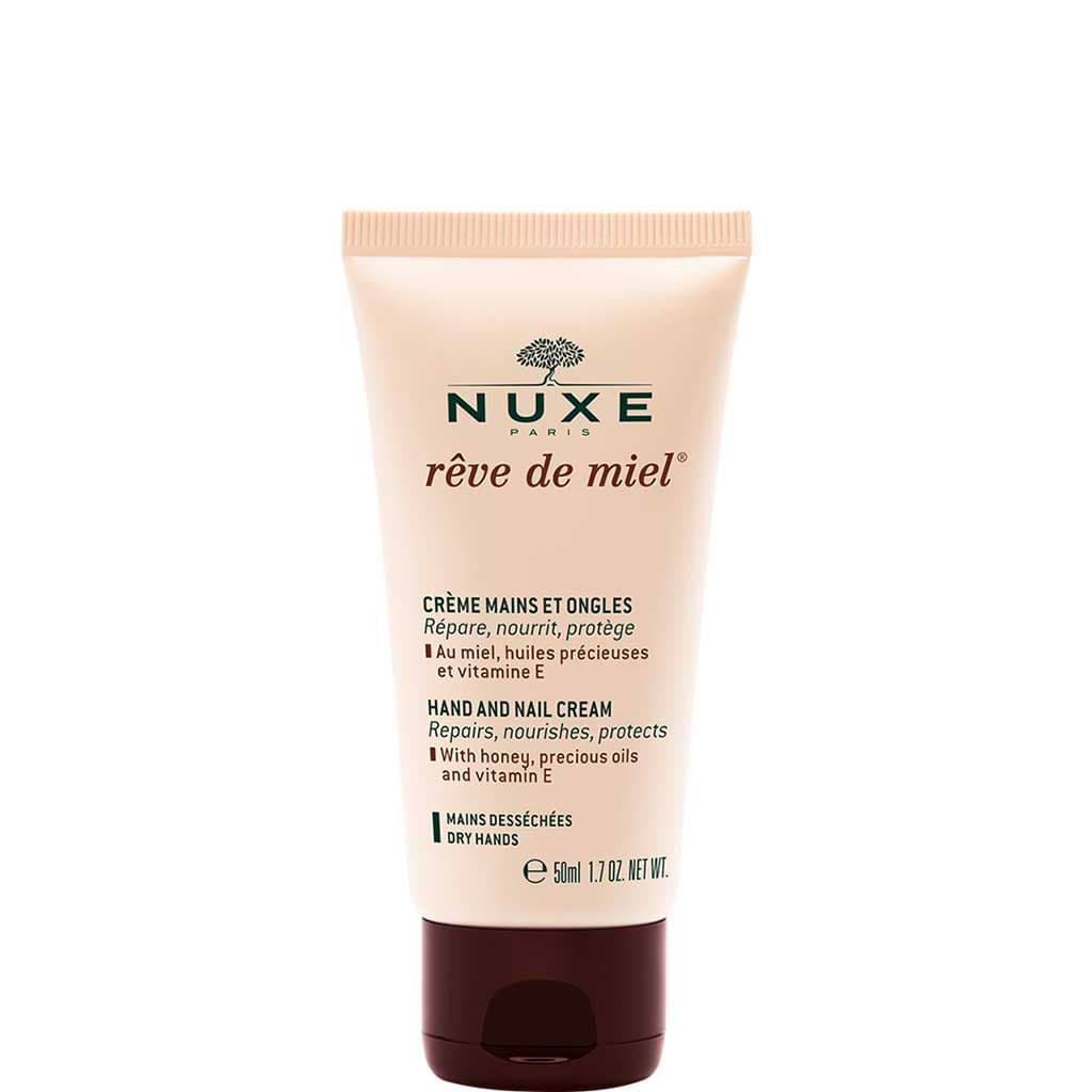 Nuxe Reve de Miel - Hand And Nail Cream 50ml - NUXE - Duty Free - קרם ידיים משיי ולא שומני זה עשוי עם דבש, שמנים יקרים וויטמין E מזין ומתקן כפות ידיים יבשות ופגומות תוך הגנה עליהן מפני הזדקנות מוקדמת של העור. יום אחרי יום,