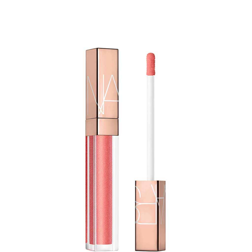 Nars AfterGlow Lipgloss - Nars - Duty Free - התפנקו אל תוך אושר צרוף עם גלוס שקוף ומפתה, בעל ברק גבוה, שמנצנץ תחת השמש. מגוון גוונים זוהרים ואריזות מפוספסות במהדורה מוגבלת מחיות את הצבעים האייקוניים
