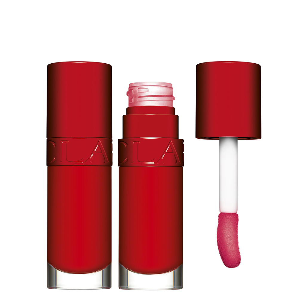 Clarins Lip Comfort Lip Oil - 10 Years Anniversary Exclusive 7ml - CLARINS - Duty Free - לרגל חגיגות העשור להשקת Lip Comfort Oil, הבושם האהוב חוזר במהדורה מוגבלת. עכשיו בגוון האדום האייקוני של 54 Iconic Red כמחווה לשנת הקמת המותג. לכבוד המאורע , הוא
