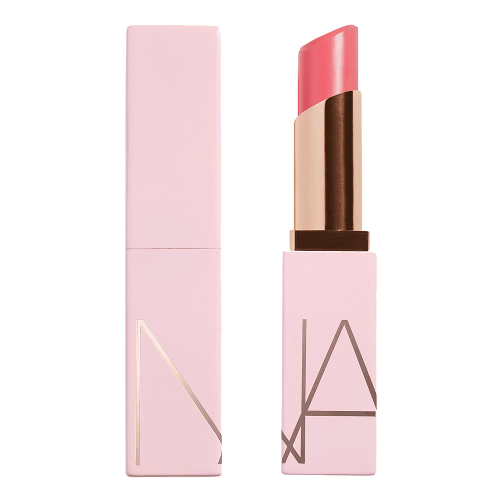 Nars Afterglow Lip Balm 3g - With A Glow Up - Nars - Duty Free - מפתה ומענג באופן בלתי עמיד. תחושה שקופה וסנסציונית. עולם הצבעים של Afterglow Lip Balm מספק כעת לשפתיים לחות 24-ל .(1)שעות באלם במרקם חמאתי עוטף את השפתיים בברק