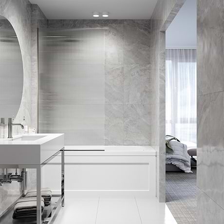 Nuvo 34x62 Reversible Fixed Bathtub Door with Fluted Glass in Stainless Steel