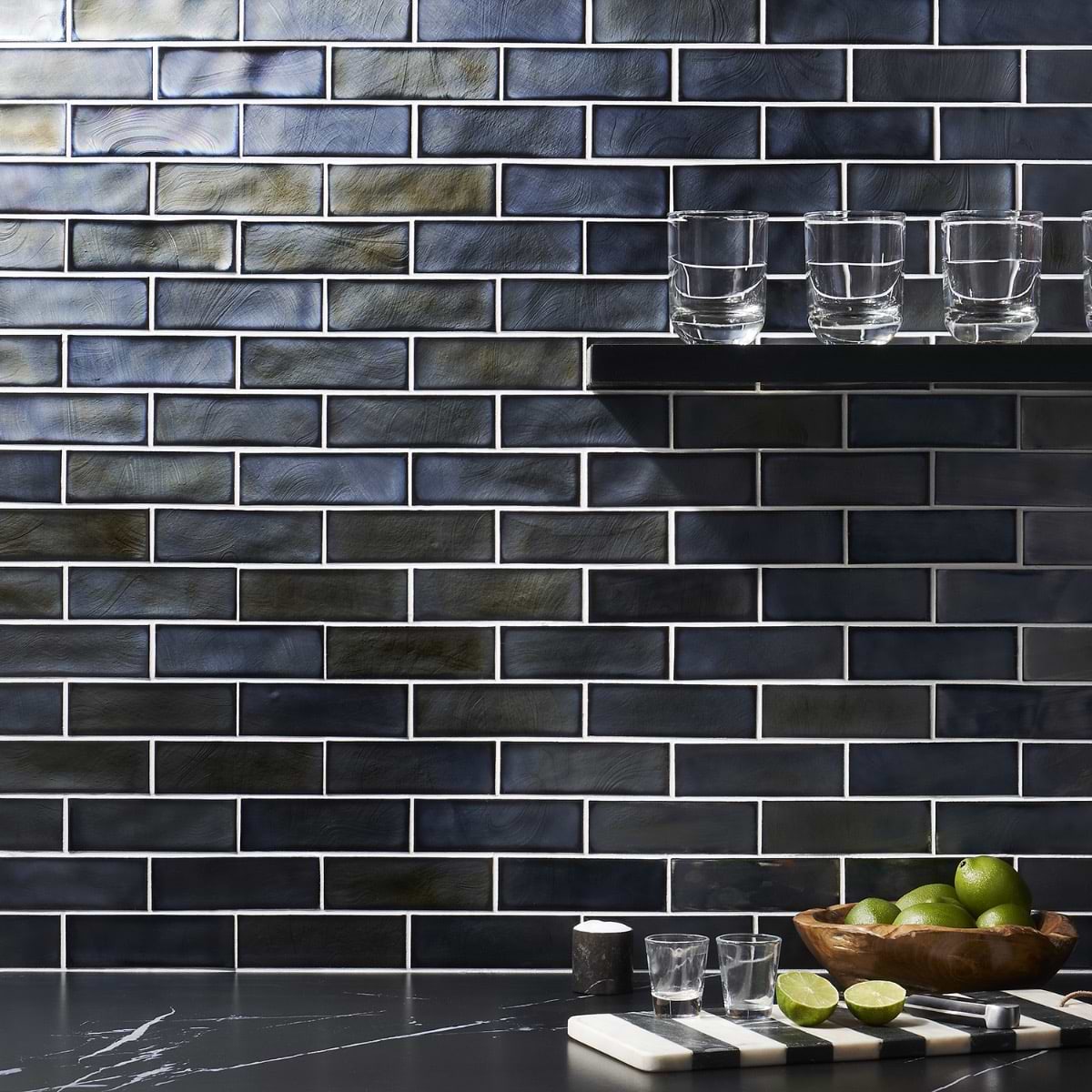 Magico Iridescent Night Black 2x6 Polished Glass Mosaic Tile; in Black, Gray Glass; for Backsplash, Bathroom Wall, Kitchen Wall, Outdoor Wall, Pool Tile, Shower Wall, Wall Tile; in Style Ideas Art Deco, Beach, Contemporary, Mediterranean, Mid Century, Modern, Transitional; released 2025; new, trends