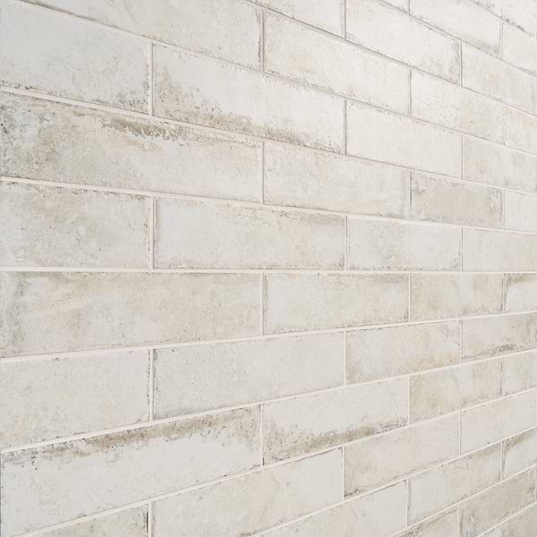 Sample-Seville Olimpia White 3x12 Travertine Look Matte Porcelain Tile