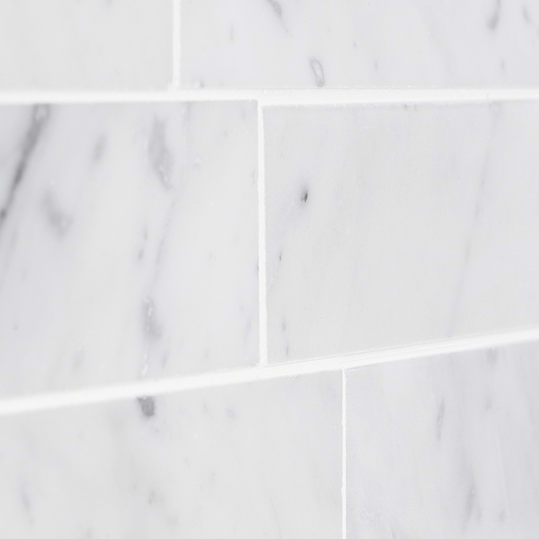 Sample of Brushed Stone Carrara Marble Subway Tile- 2x8 ($16.95 Per Sq. Ft.)