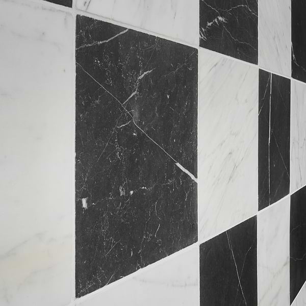 Avanti Nero Marquina Black and Calacatta Gold 12x12 Tumbled Marble Checkerboard Tile