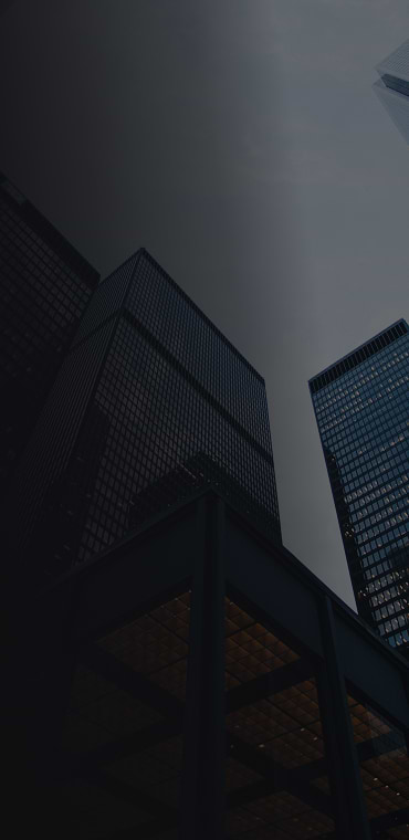 Low-angle view of glass high-rise office buildings
